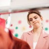 consumer experiencing frustration during the shopping journey inside a fashion retail store